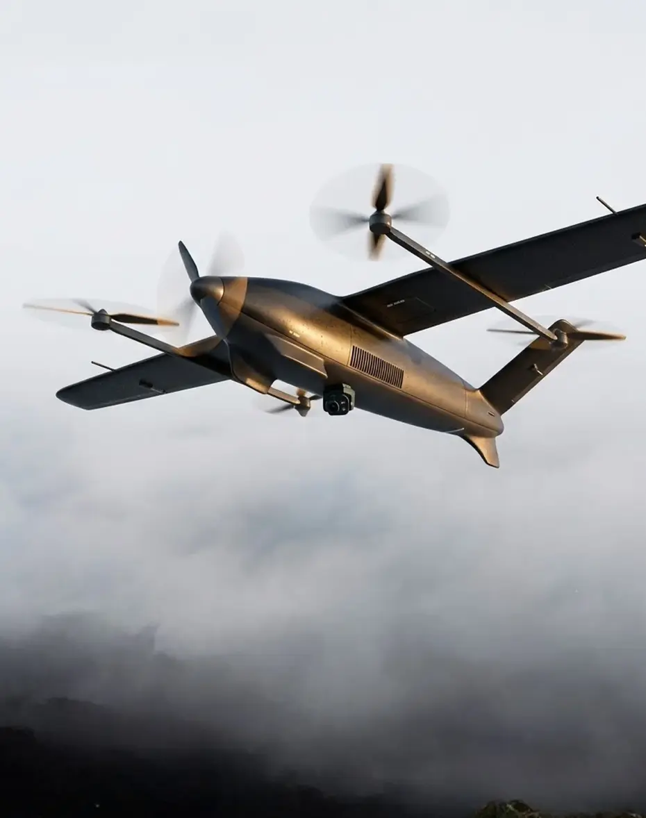 Target tracking drone over landscape